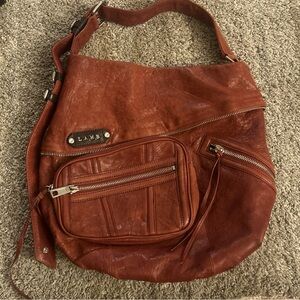 L.A.M.B Gwen Stefani Buckle & Zipper Accent Red Leather Hobo Shoulder Bag